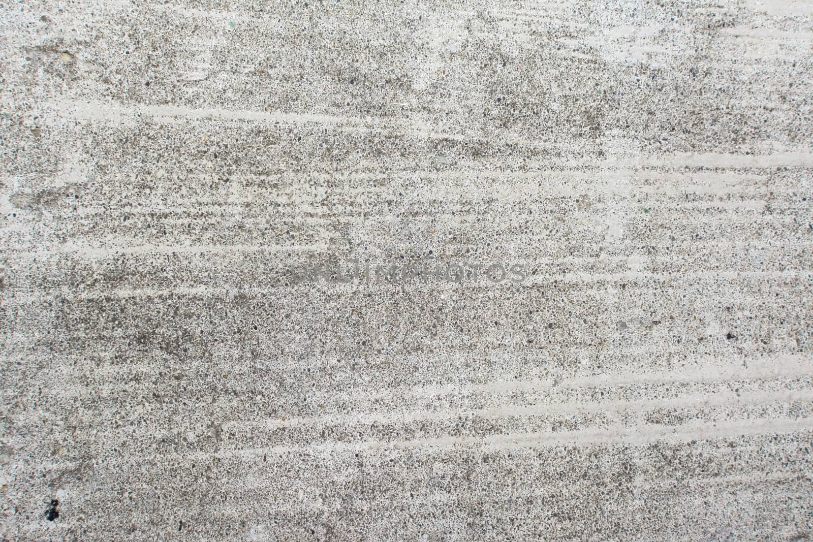 Cement wall background with rough surface texture.