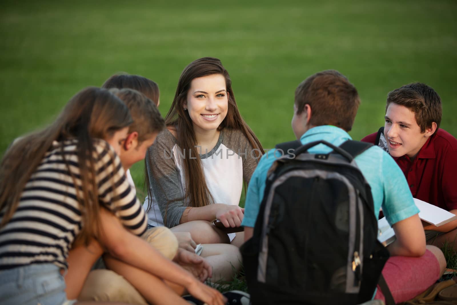 Girl Talking with Classmates by Creatista