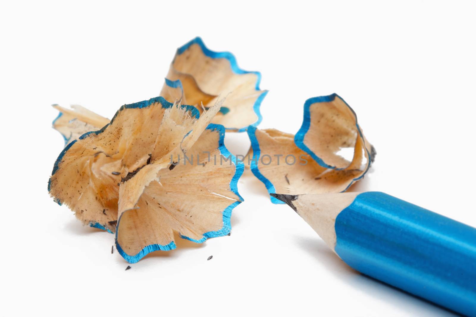 pencil with shavings after being sharpened isolated on white