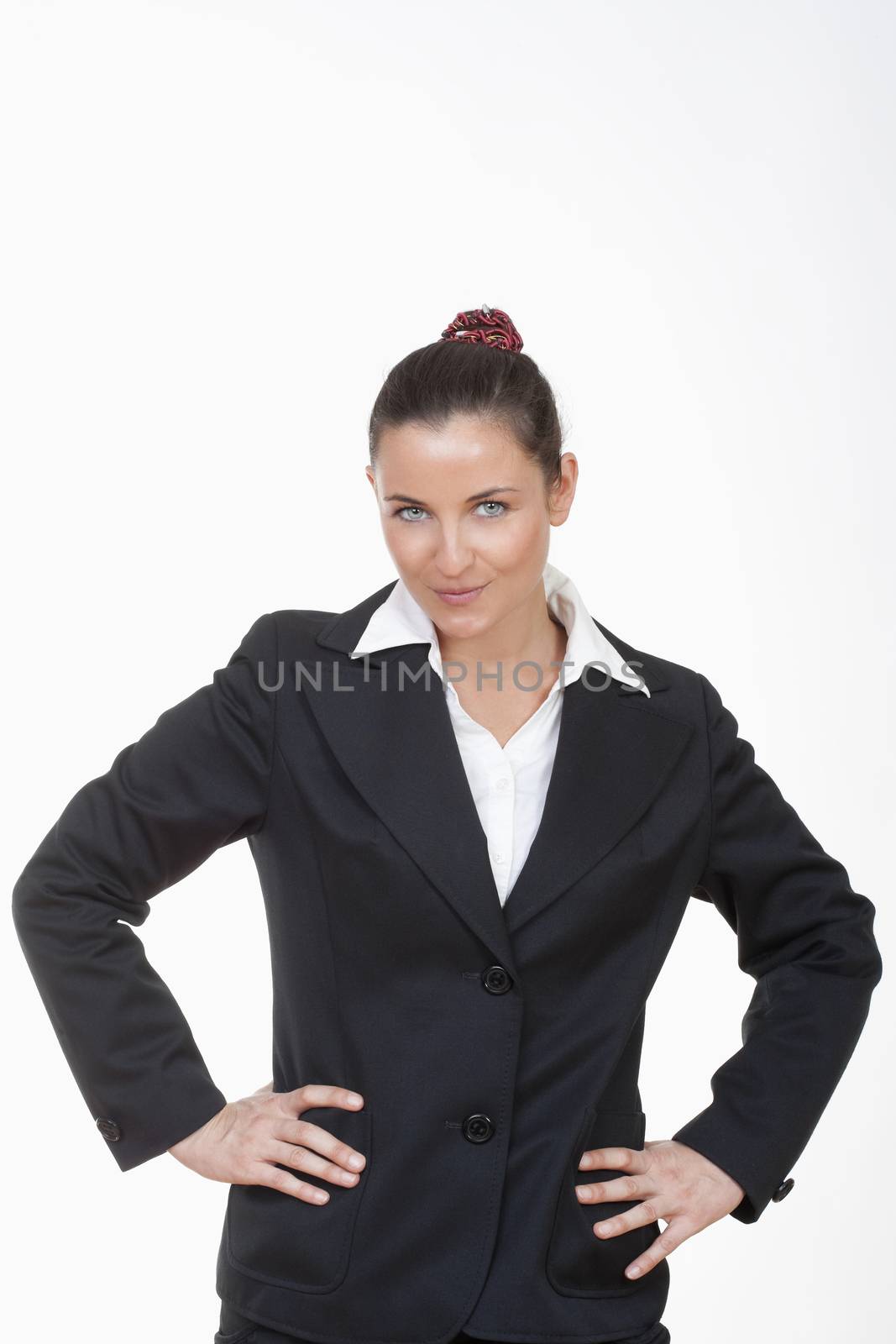 beautiful businesswoman looking at camera isolated on white