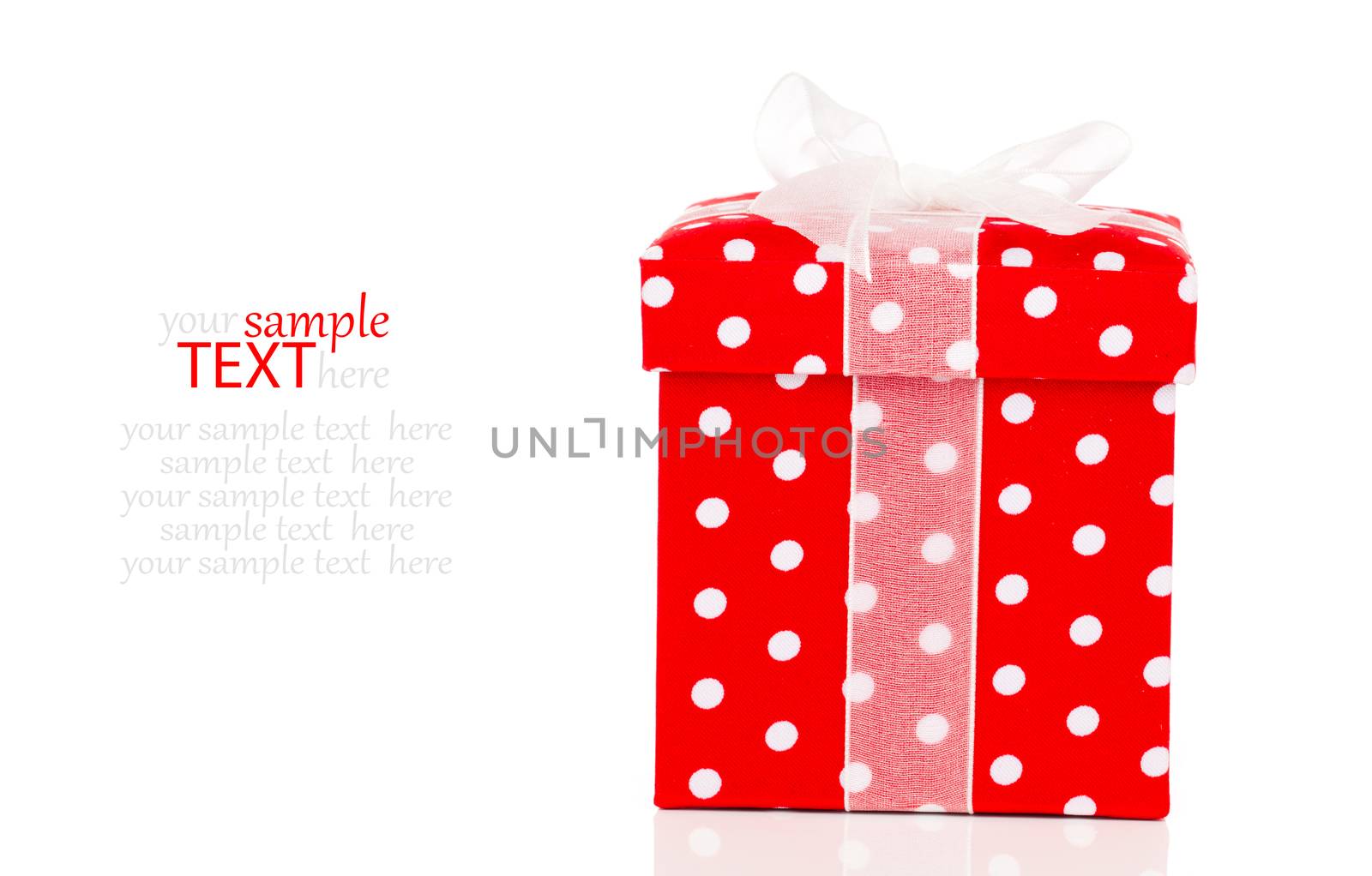 red gift box with bow on white background