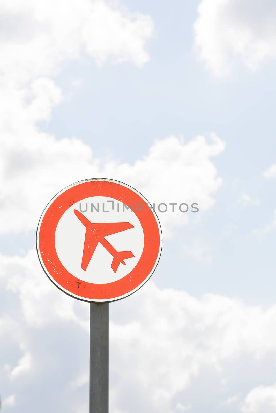 Isolated road sign with sky in background.