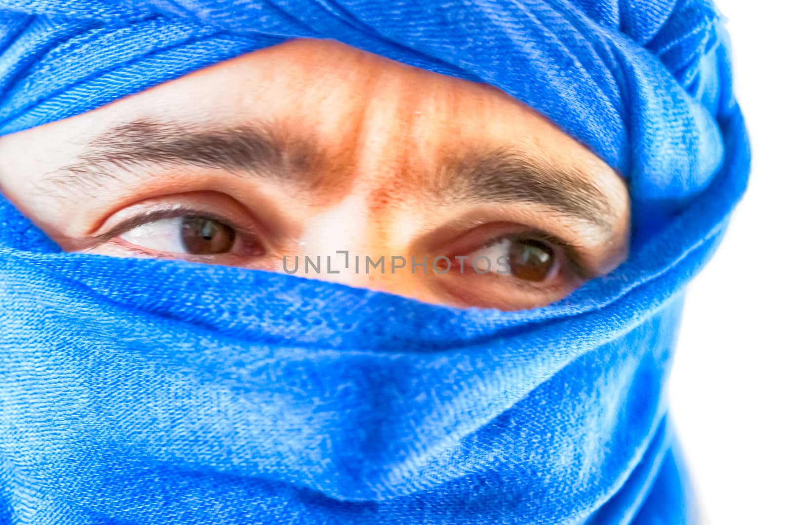 beautiful macro of man with blue keffiyeh