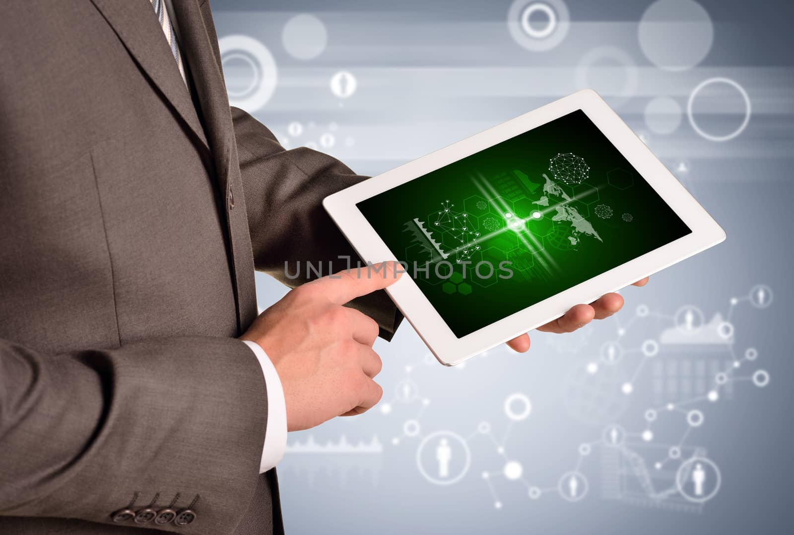 Man hands using tablet pc. Image of business elements on screen by cherezoff