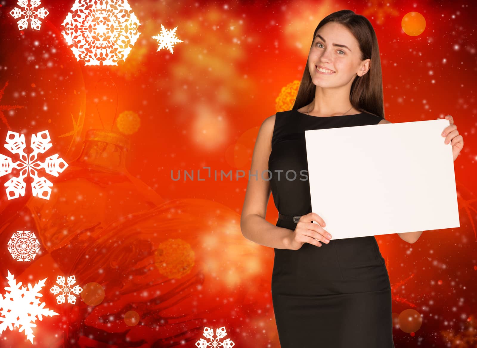 Businesswoman holding empty paper. Abstract christmas backgrond