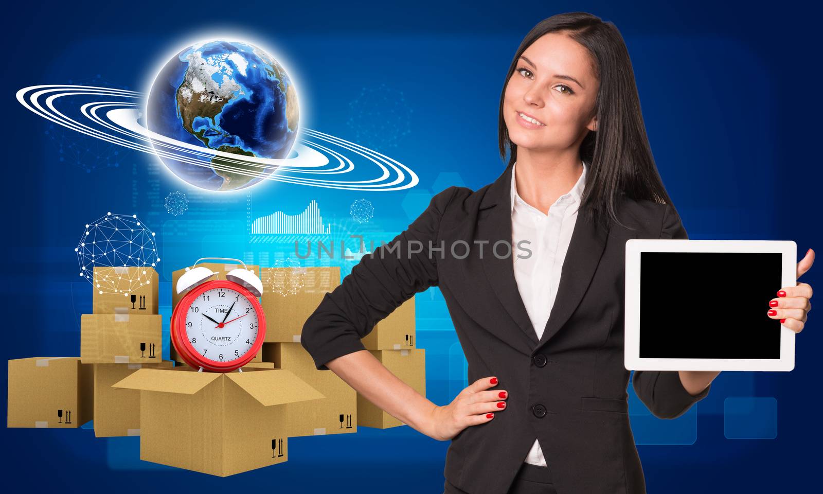 Businesswoman hold tablt pc with empty screen. Earth and heap of cardboard boxes with alarm clock as backdrop. Element of this image furnished by NASA