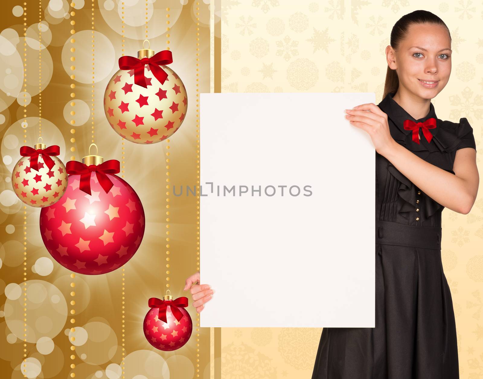 Businesswoman holding empty paper. Christmas tree balls as backdrop