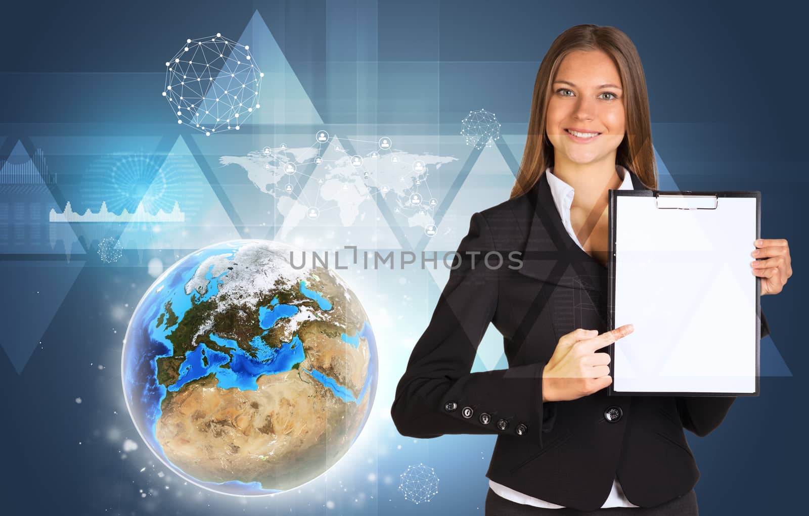 Beautiful businesswoman in suit holding paper holder. Earth, triangles and graphs in background. Elements of this image furnished by NASA