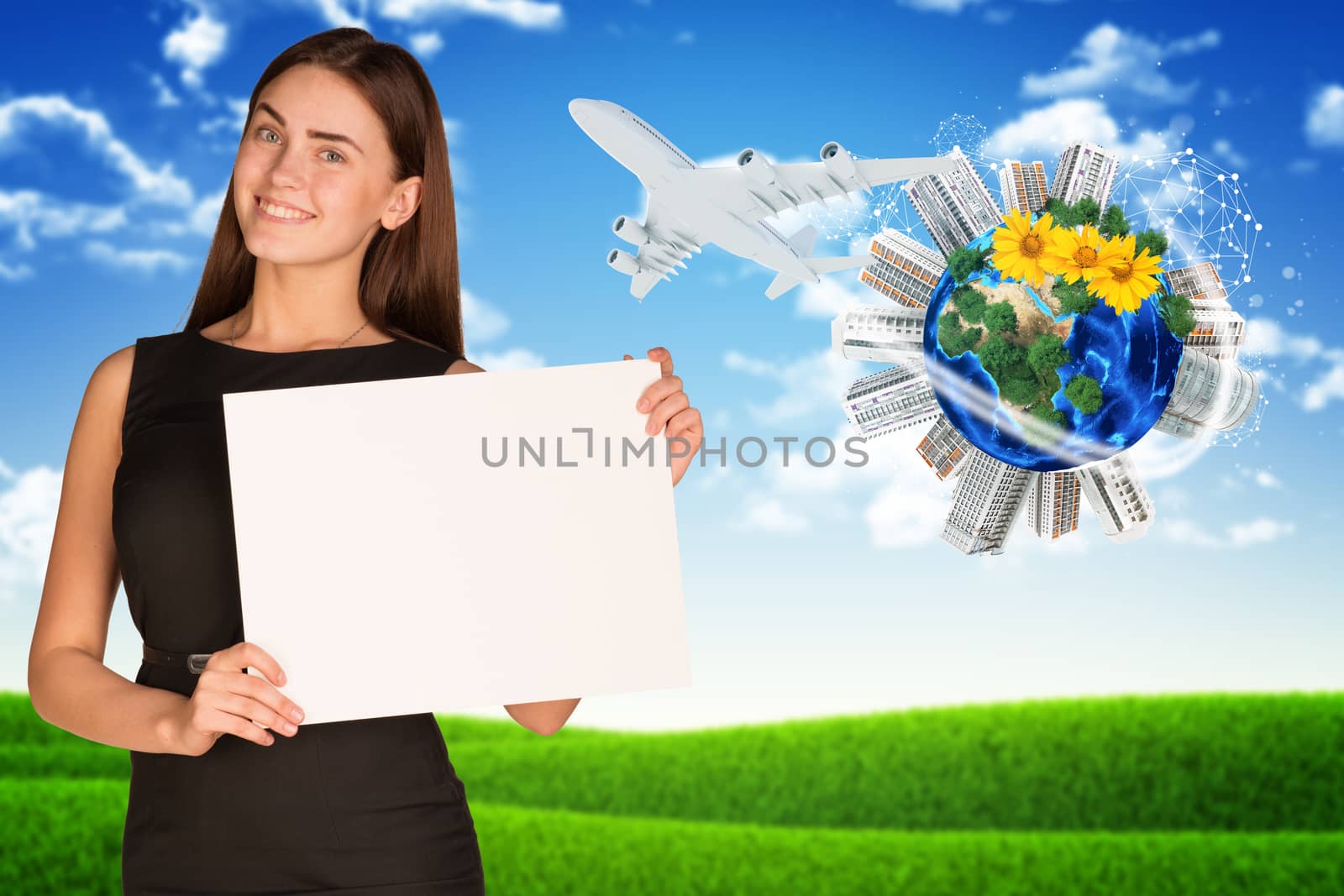 Businesswoman holding empty paper. Earth with buildings and nature landscape by cherezoff