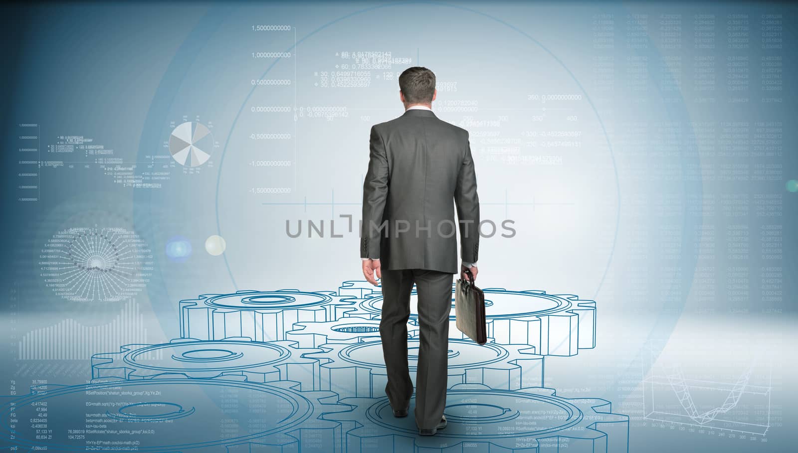 Businessman in suit holding briefcase and goes forward. Rear view. Wire-frame gears gear underfoot. Graphs as backdrop