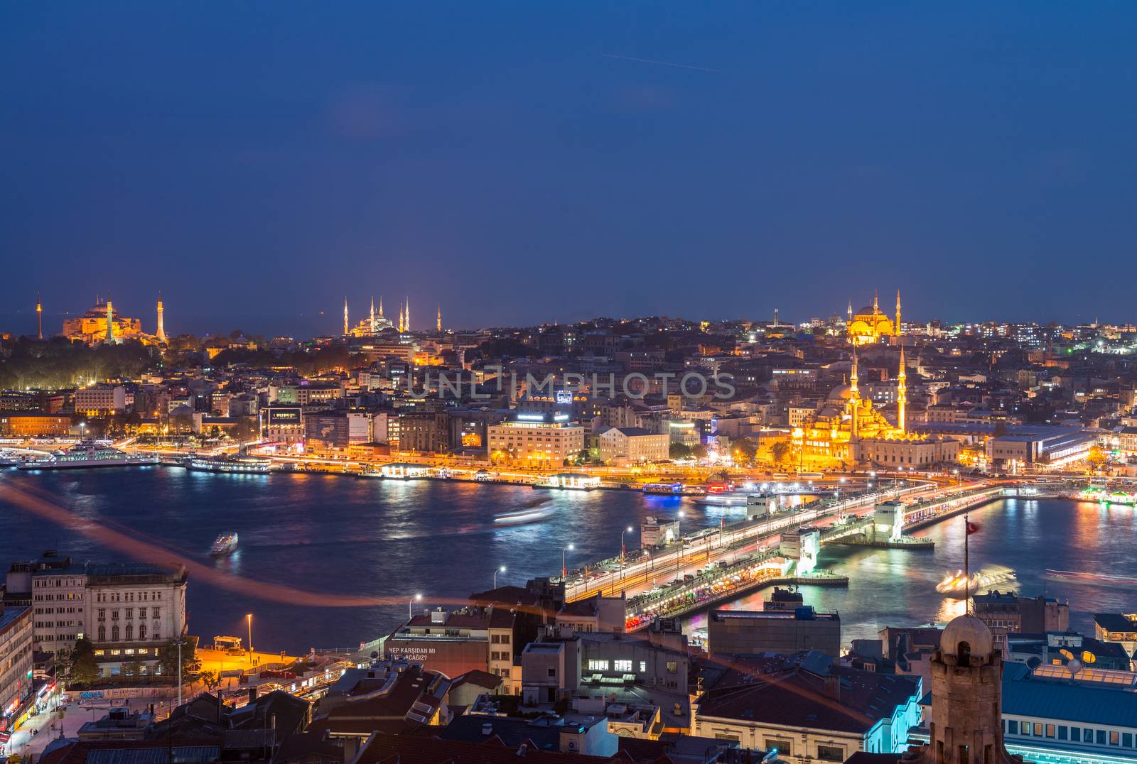 ISTANBUL - SEPTEMBER 17, 2014: City night panorama with Blue Mos by jovannig