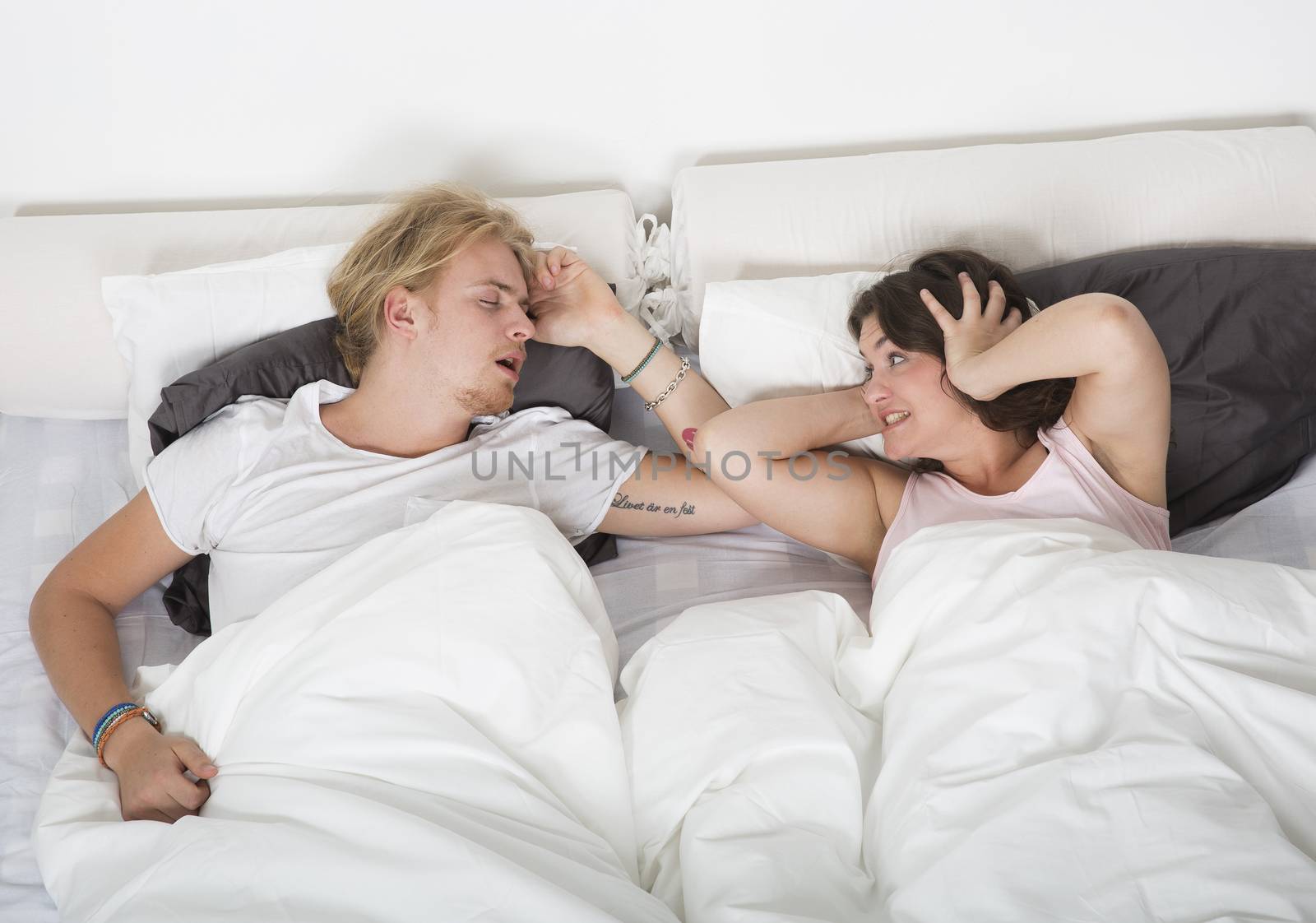 Frustrated wife when husband snoring