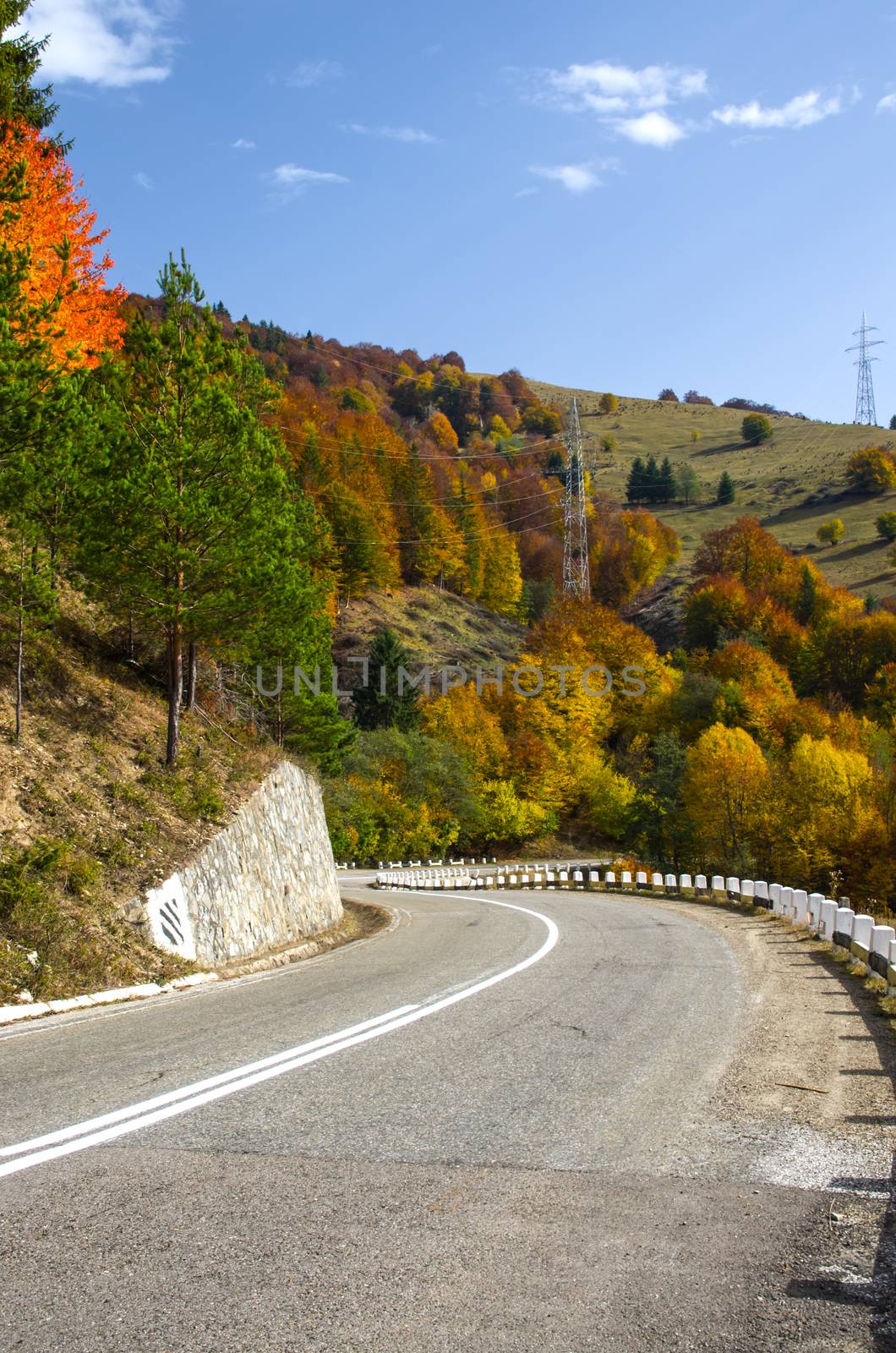 Beautiful curvy road in autumn, Moldavia.