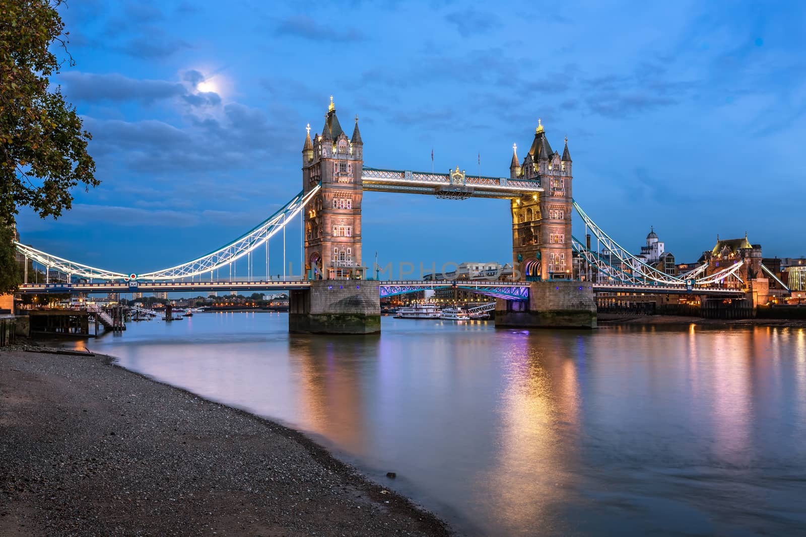 Tower Bridge and Thames River Lit by Moonlight at the Evening, London, United Kingdom