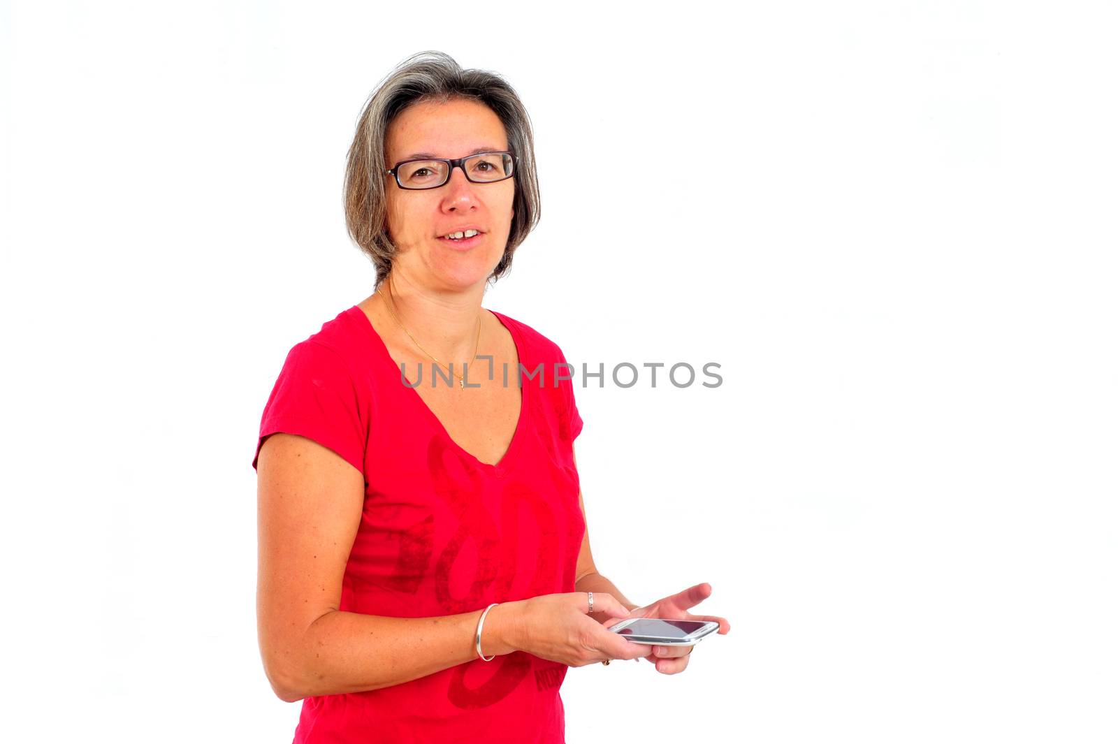 Woman in red t shirt on smartphone in studio by seawaters