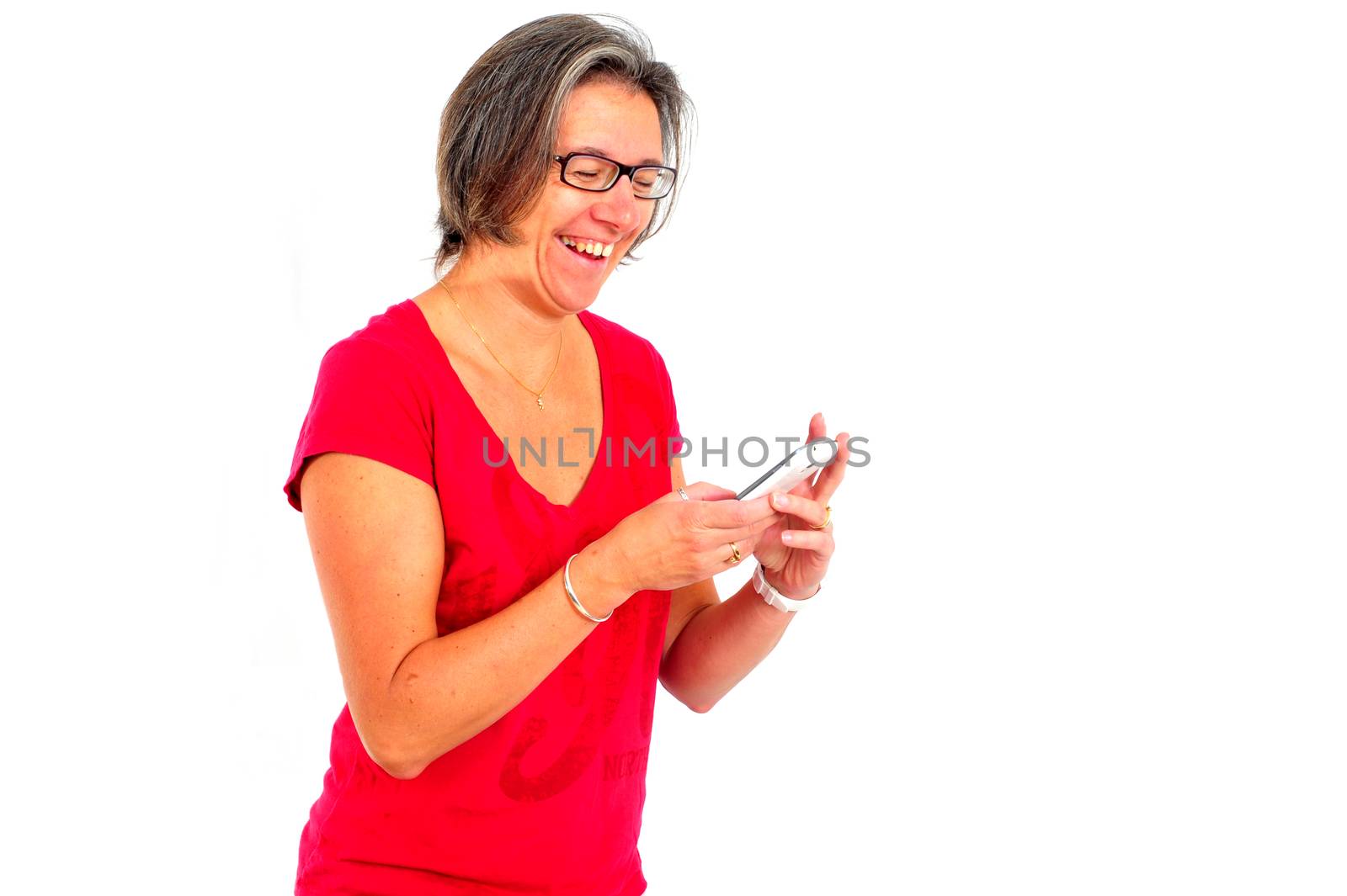 Woman in red t shirt on smartphone in studio by seawaters