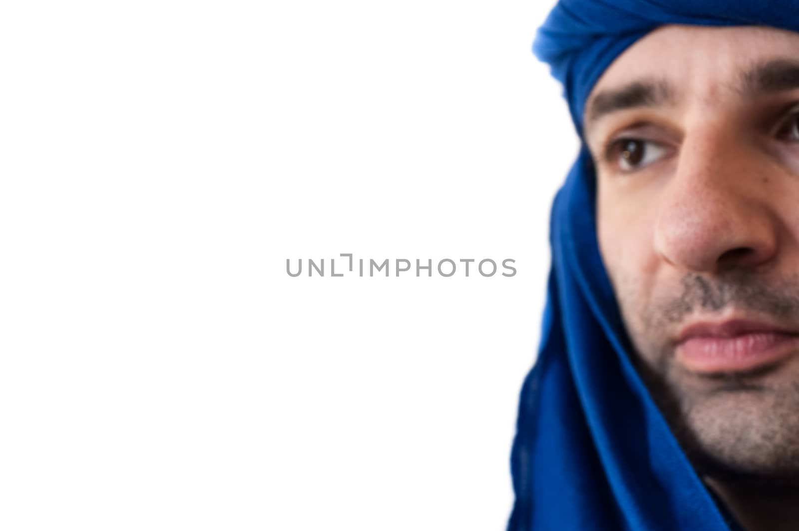 beautiful macro of man with blue keffiyeh