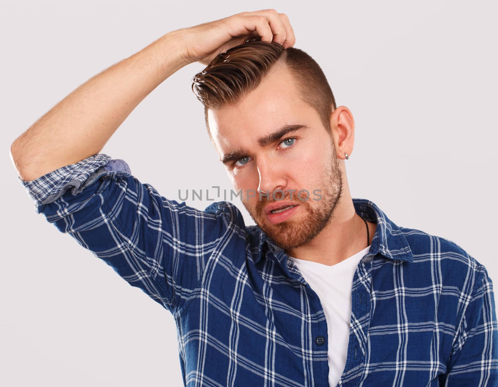 Emotions. Young man in blue shirt by rufatjumali