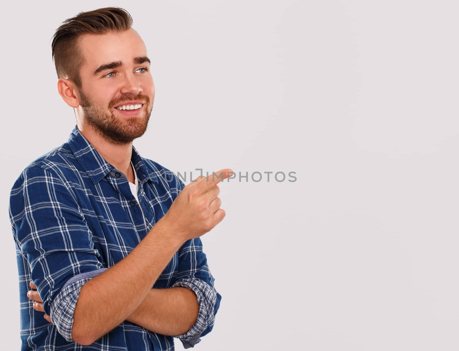 Emotions, feelings. Young guy with on a white background