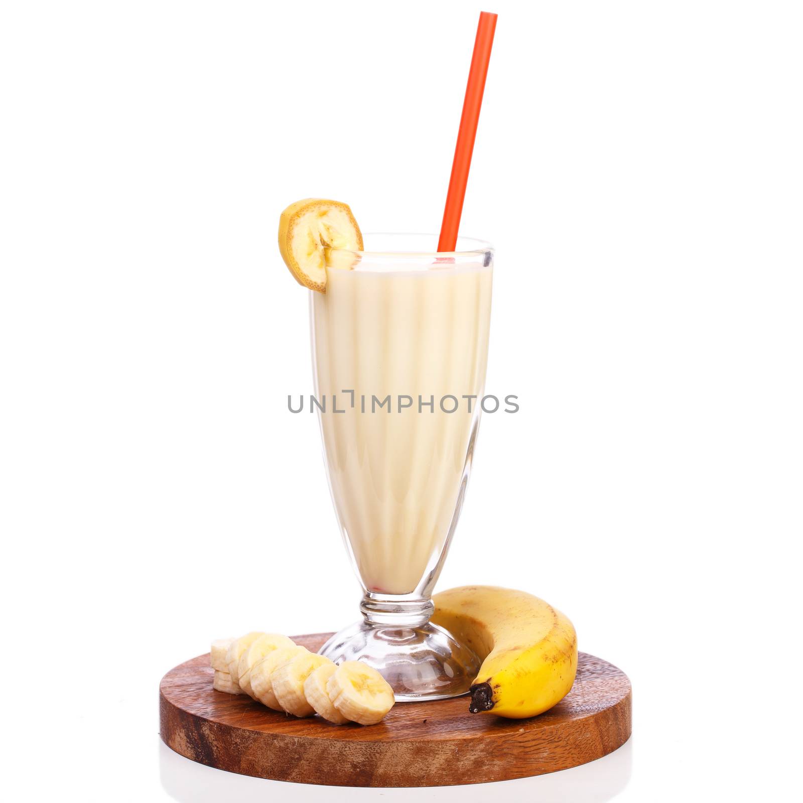 Yummy banana milkshake on a white background