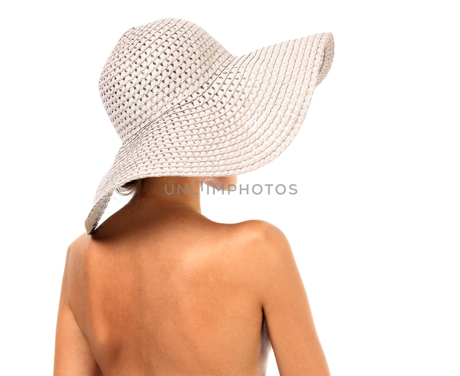 Naked woman in a sunhat, isolated on white background by Nobilior