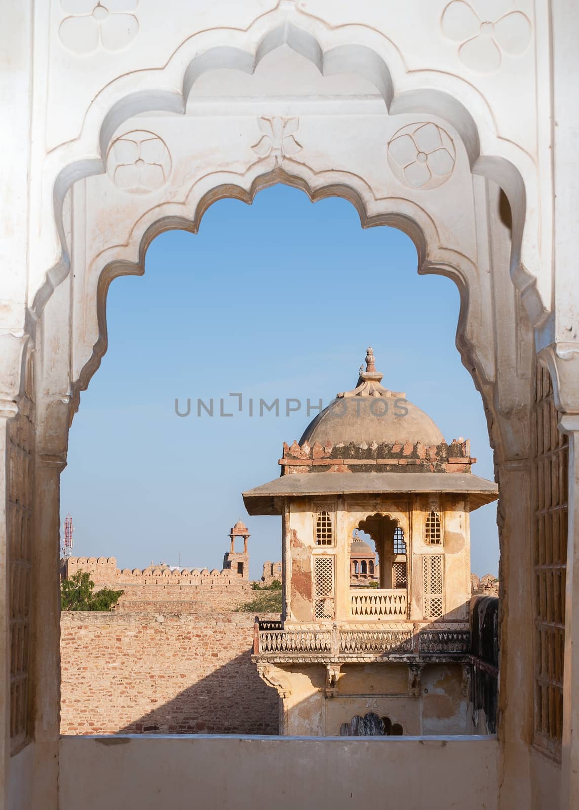 Looking on the roof structures through a double peacock arch at  by Claudine