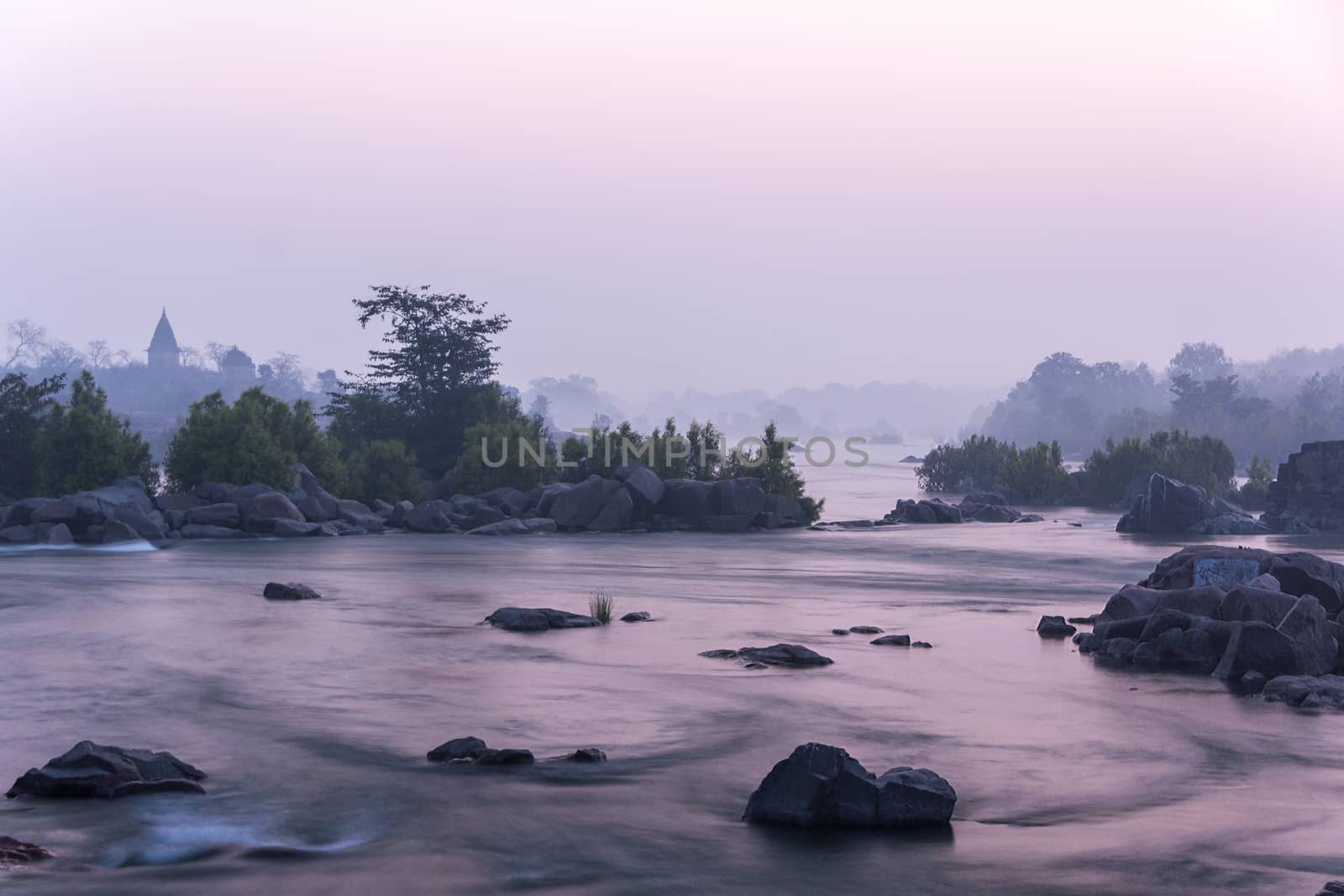 Morning breaks over the Betwa River in India's Orchha. by Claudine