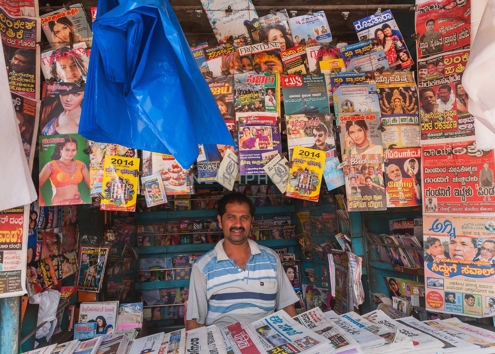 BANGALORE, INDIA - CIRCA OCTOBER 2013: Magazine and newspaper st by Claudine