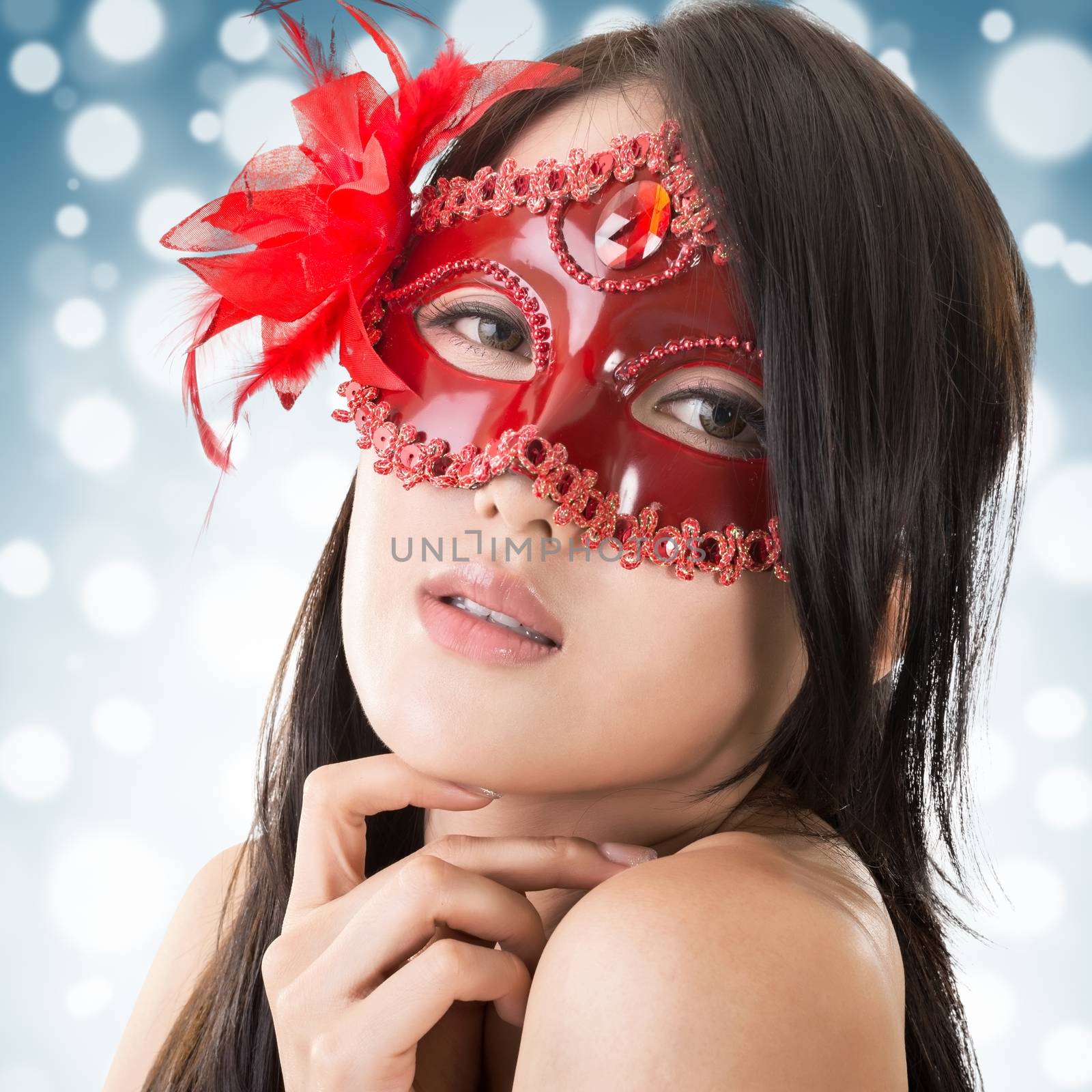 beautiful woman in a carnival mask by elwynn