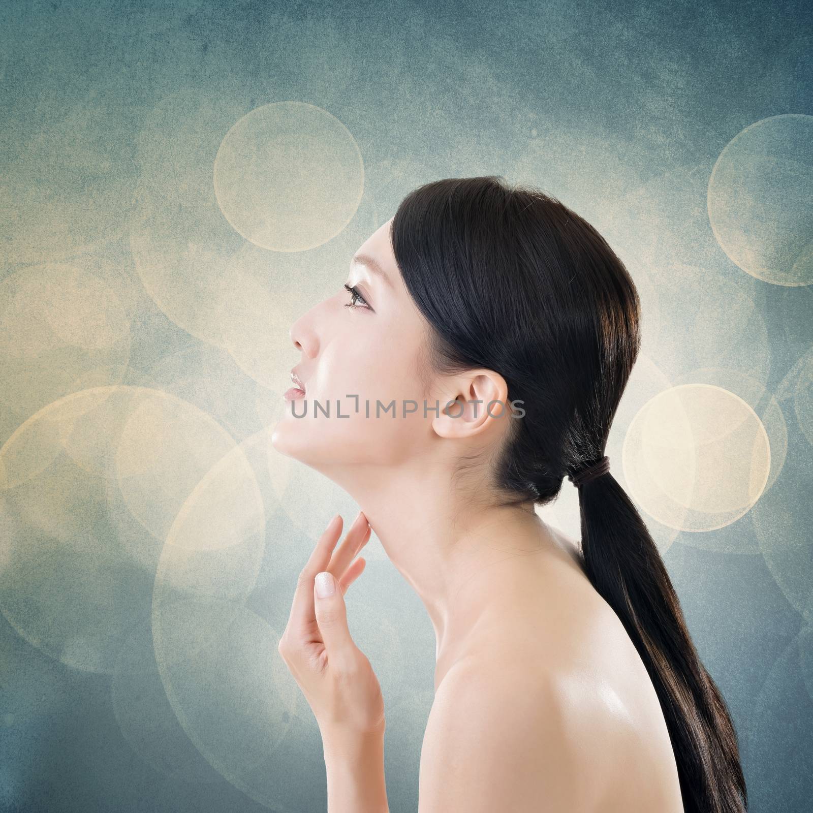 Asian beauty face closeup portrait with clean and fresh elegant lady. Side view.