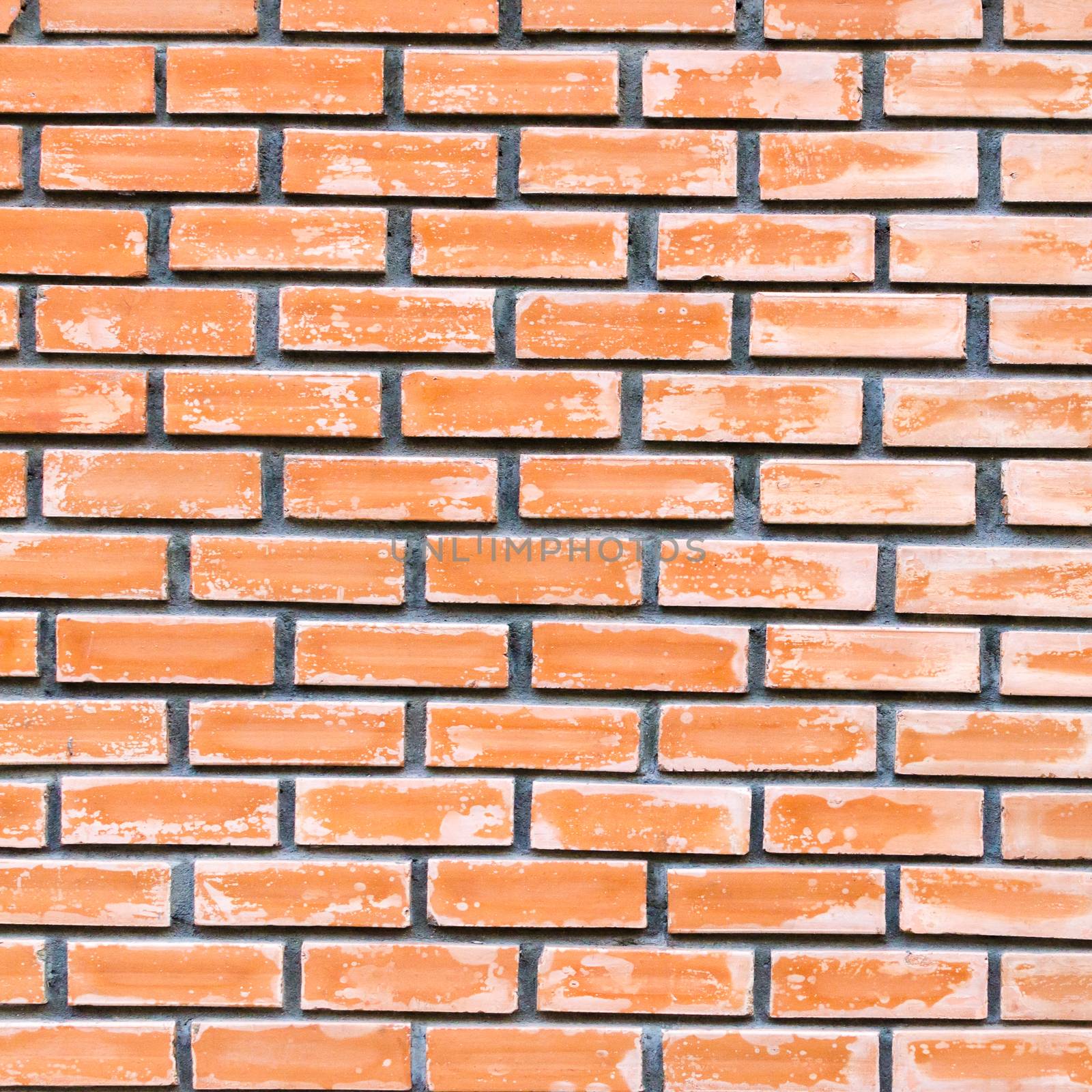 Red brick wall texture background by nopparats