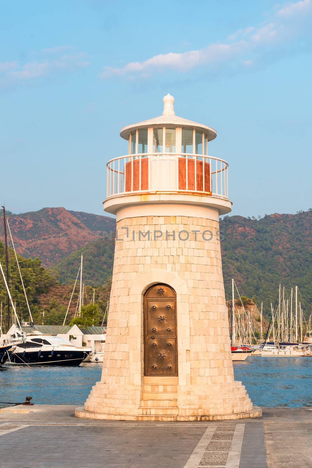 lighthouse at sunset in the port Marmaris