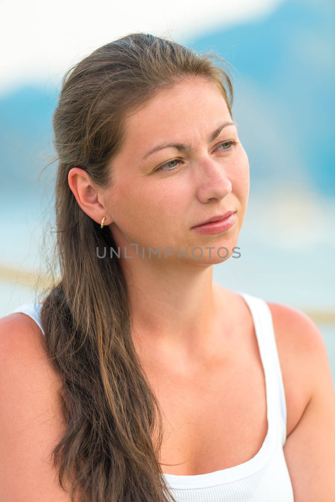 thoughtful beautiful brunette near the sea by kosmsos111