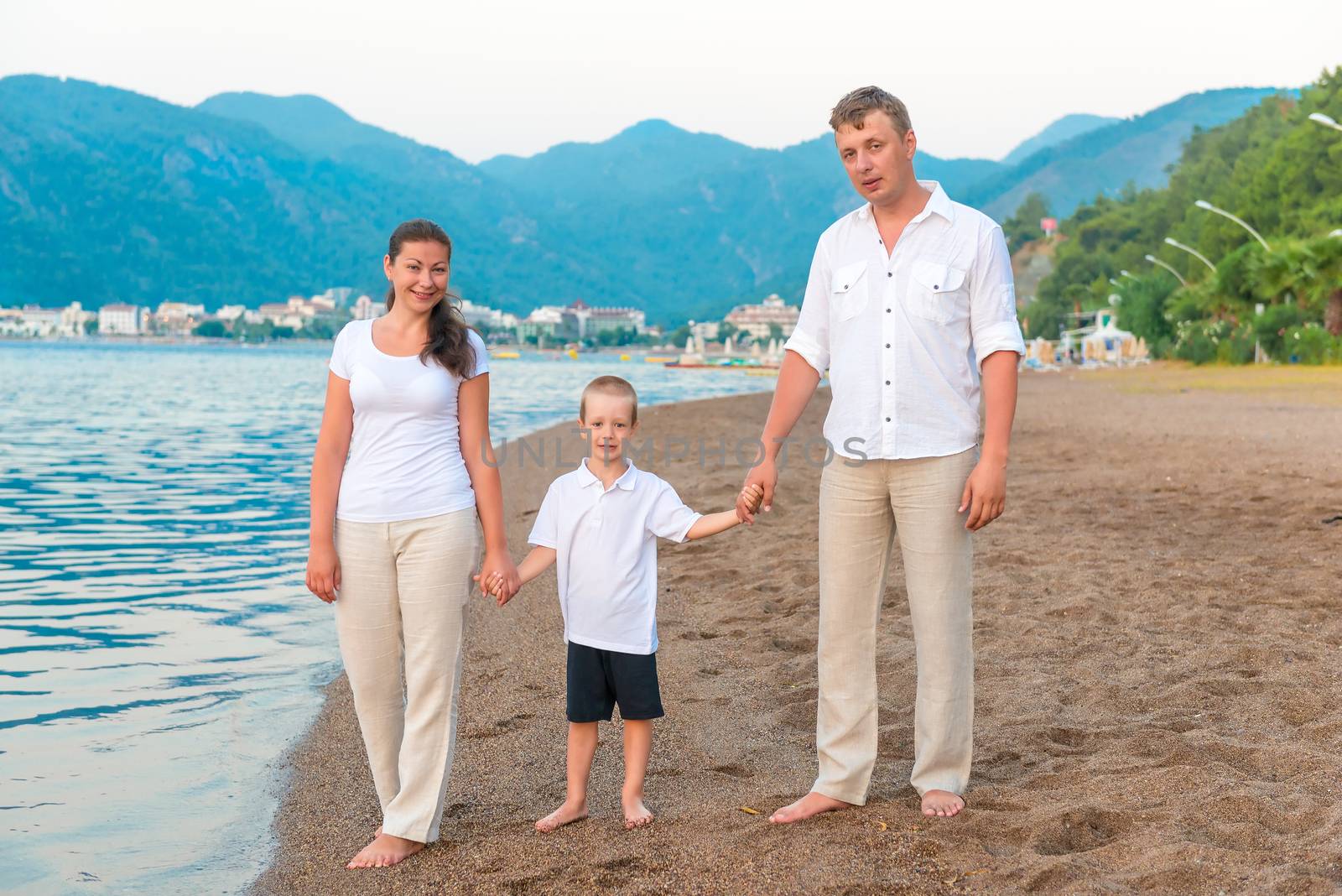 happy family on vacation near the sea