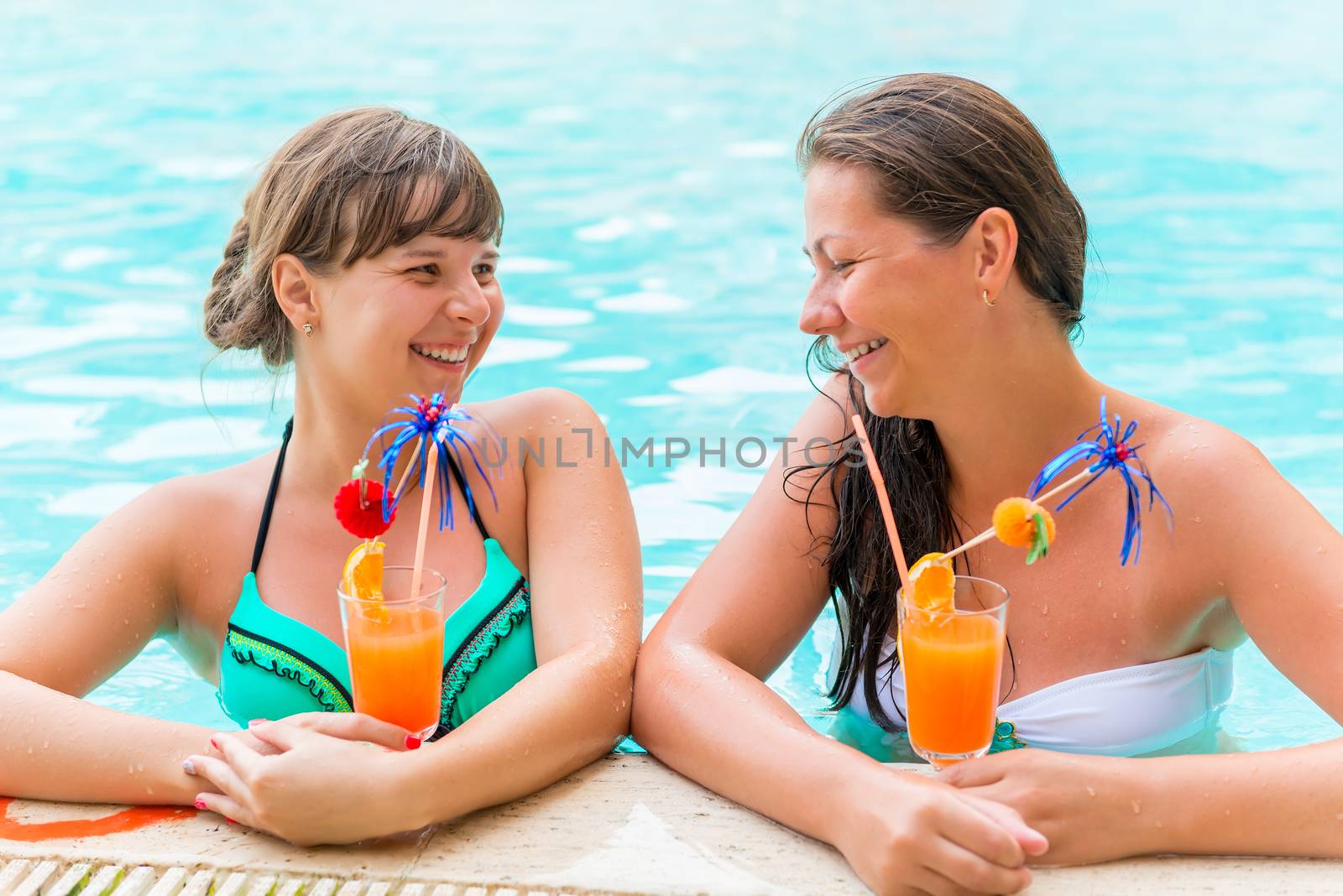 two friends laughing and joking in the pool by kosmsos111