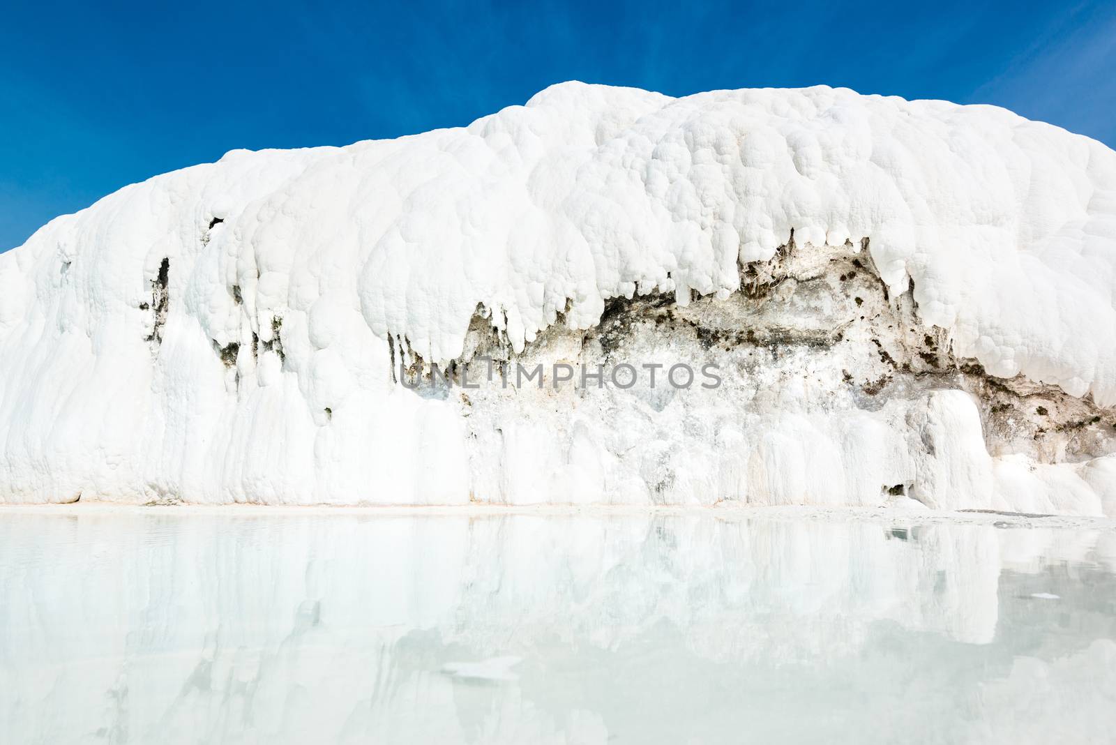 Travertine pool as part of the natural phenomenon in Pamukkale, Turkey