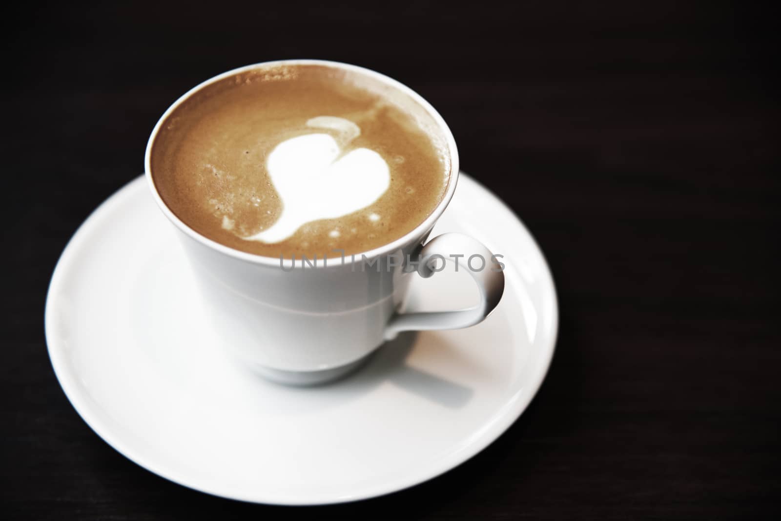 Hot coffee cup on table