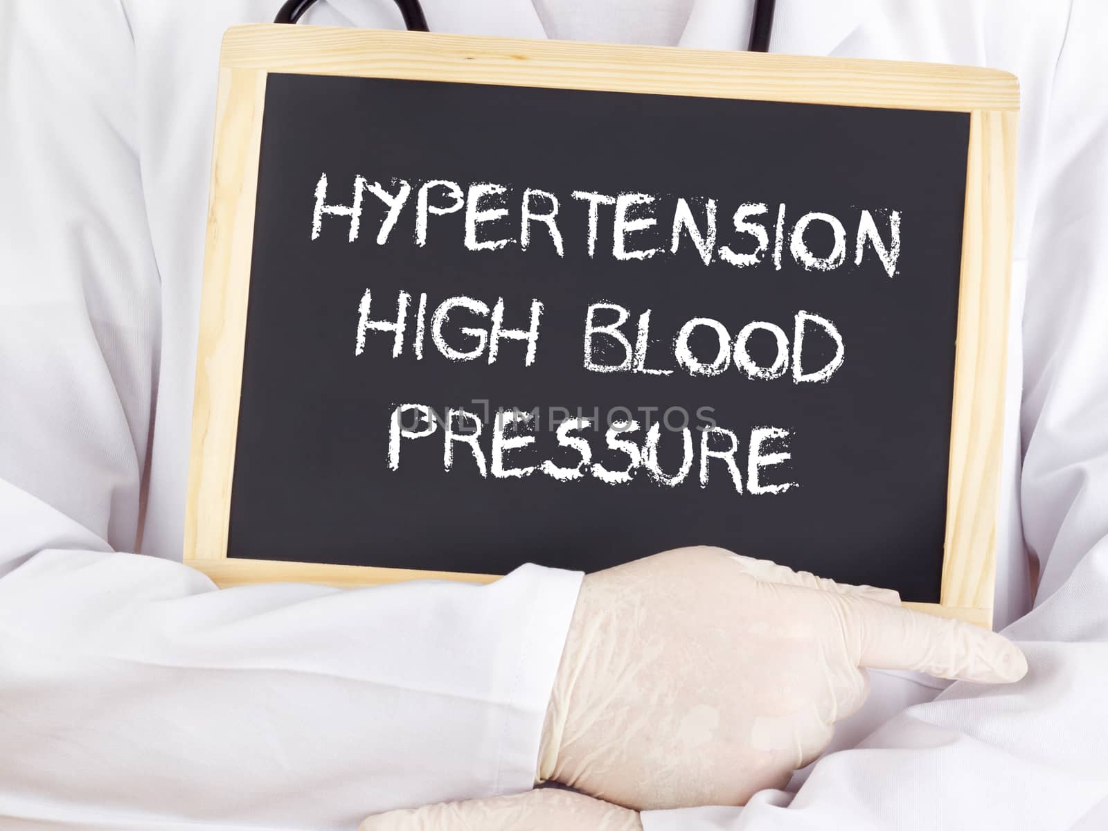 Doctor shows information: hypertension high blood pressure