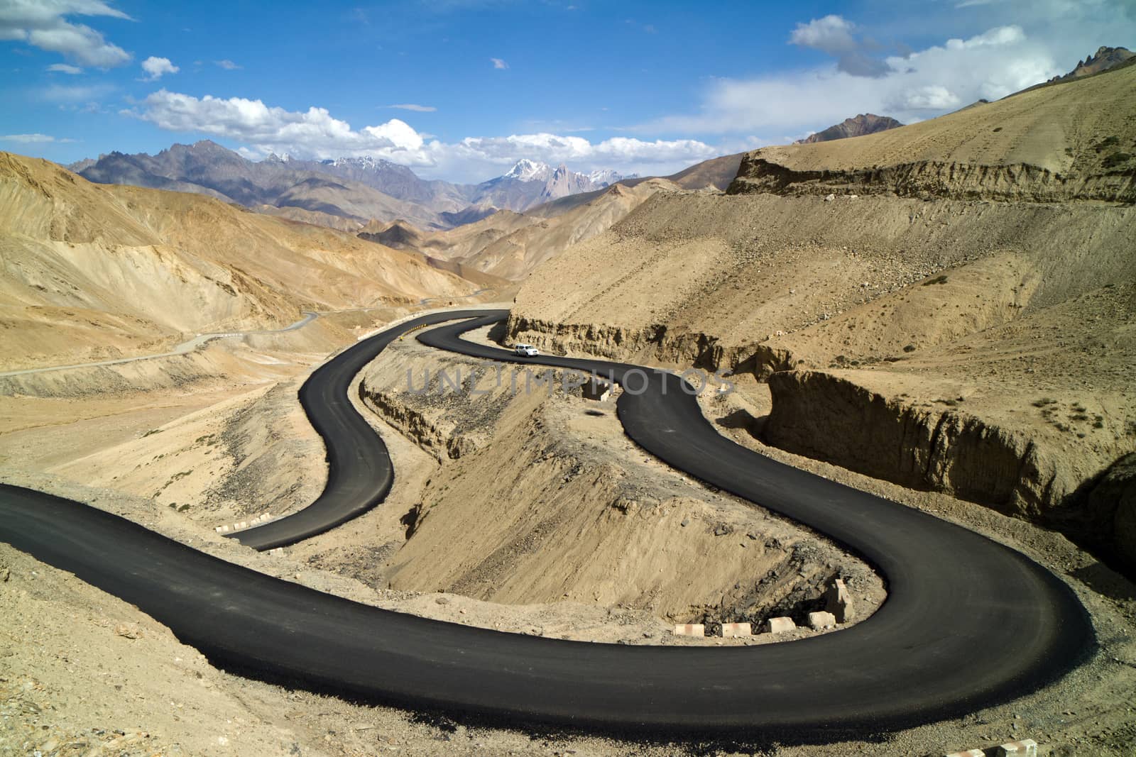 The new road in the Himalayas mountains by straannick