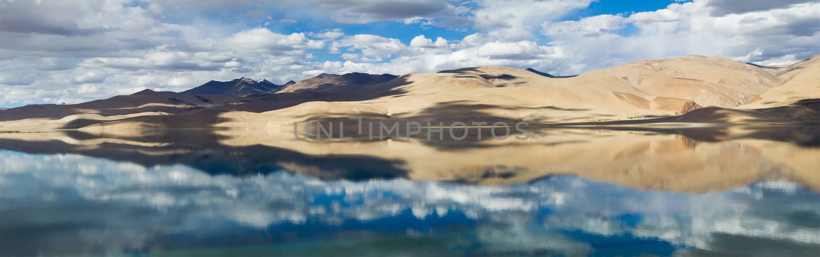 Tsomoriri mountain lake panorama with mountains and blue sky ref by straannick