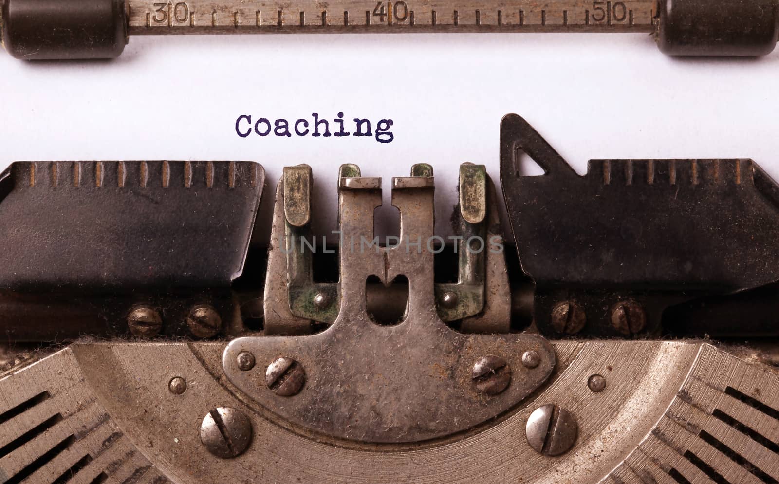 Vintage inscription made by old typewriter, coaching