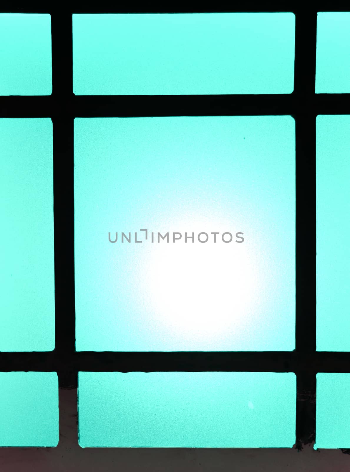 Abstract background of colored glasses of lamp.
