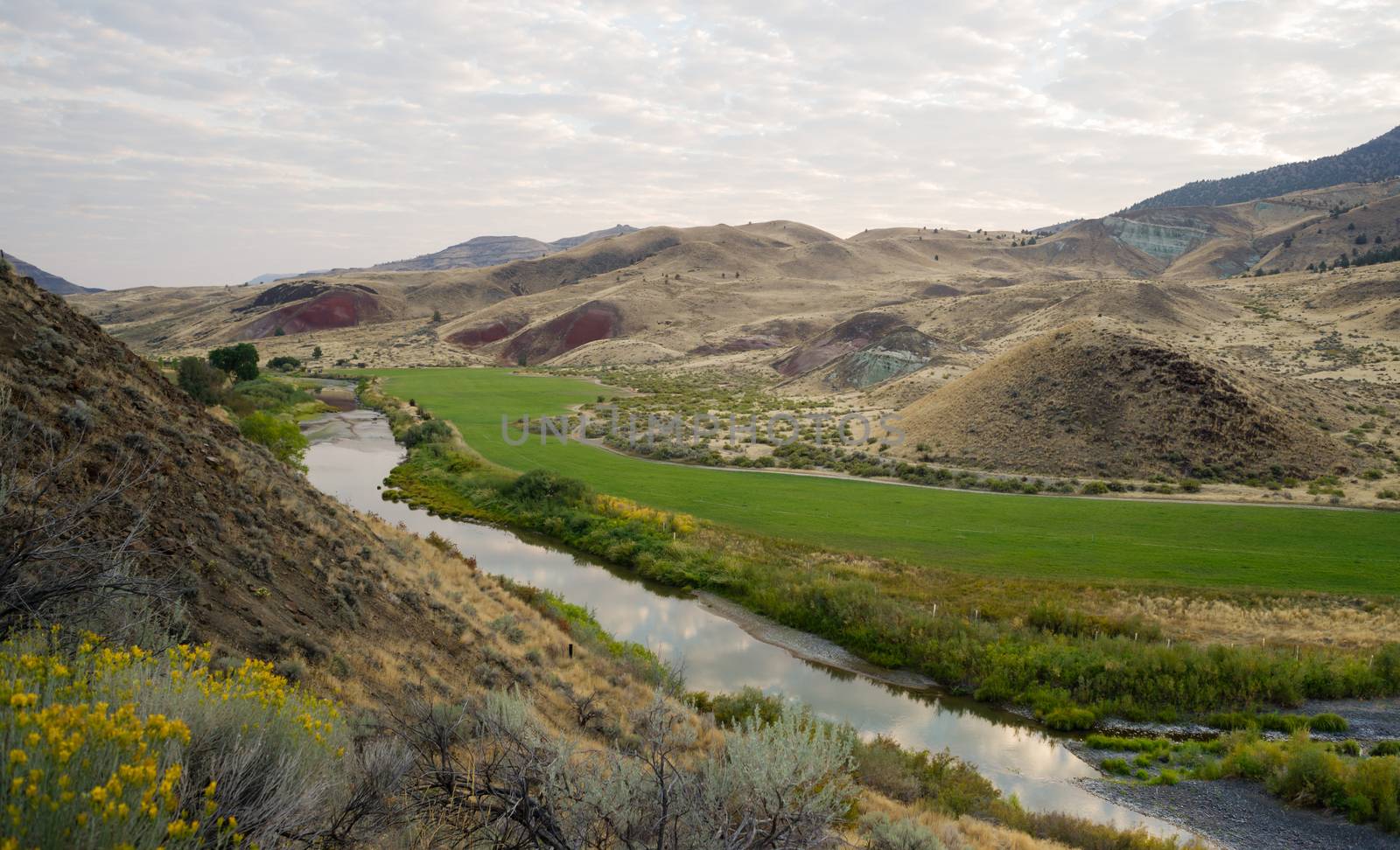 The sun readies to come up over urban landscape in the fossil beds