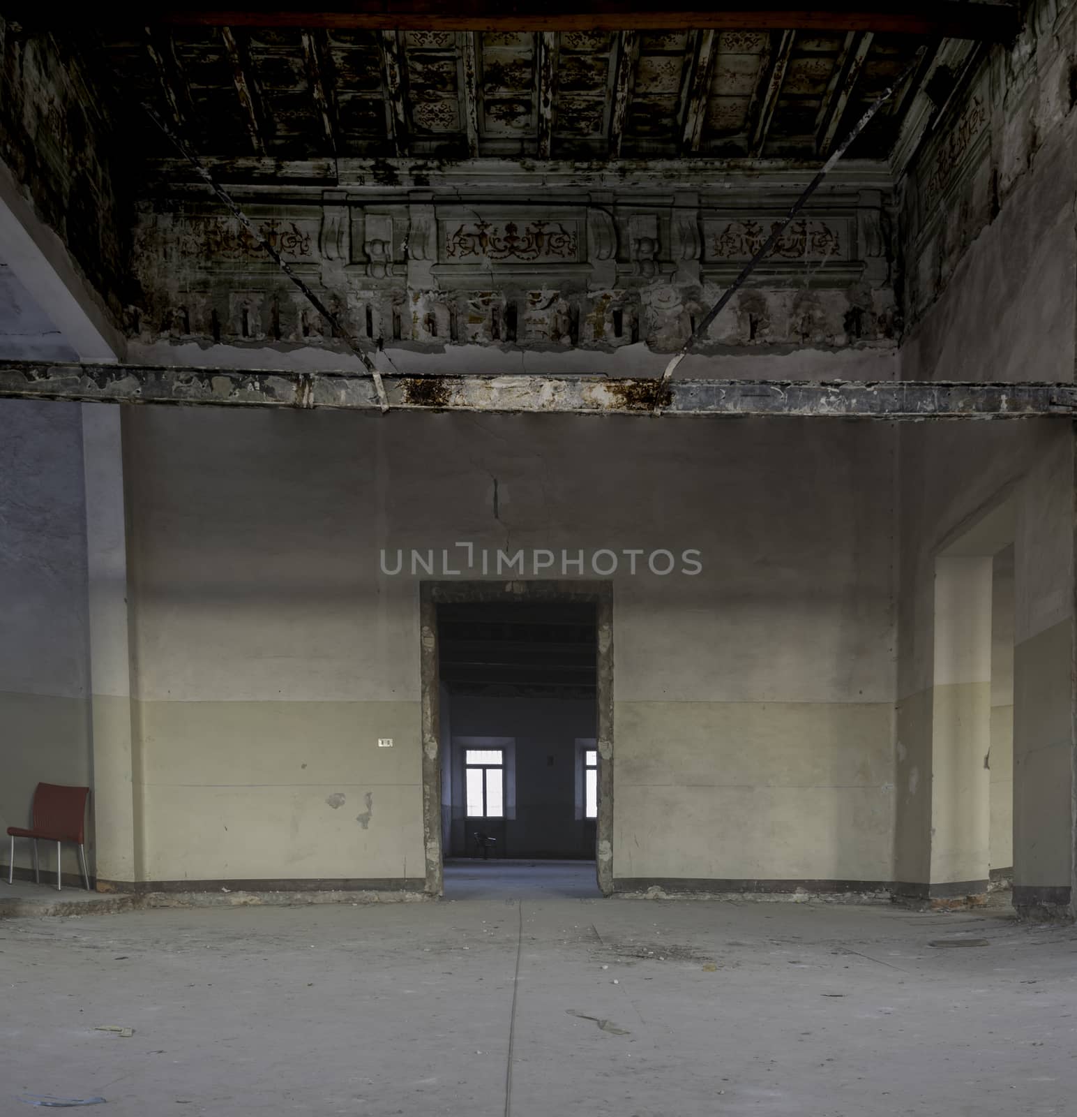 Interiors of an abandoned madhouse in the downtown by enrico.lapponi