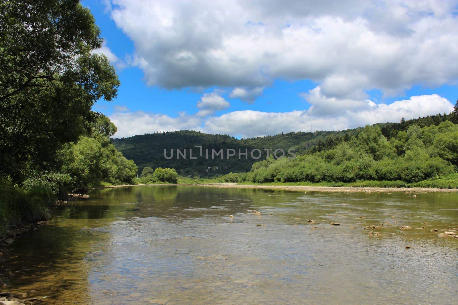 beautiful landscape with speed river in Carpathian mountains