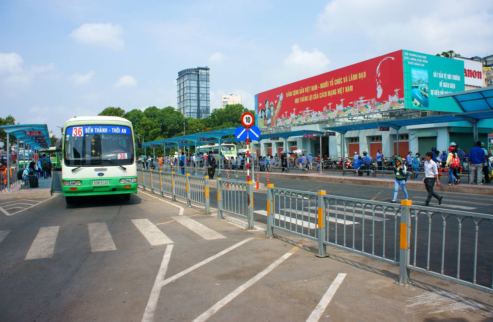 HO CHI MINH, VIET NAM: Passenger bus transport people in city, stop at Ben Thanh bus station, this public service center is place regulate activity for transportation by buses, Vietnam, April 16, 2014