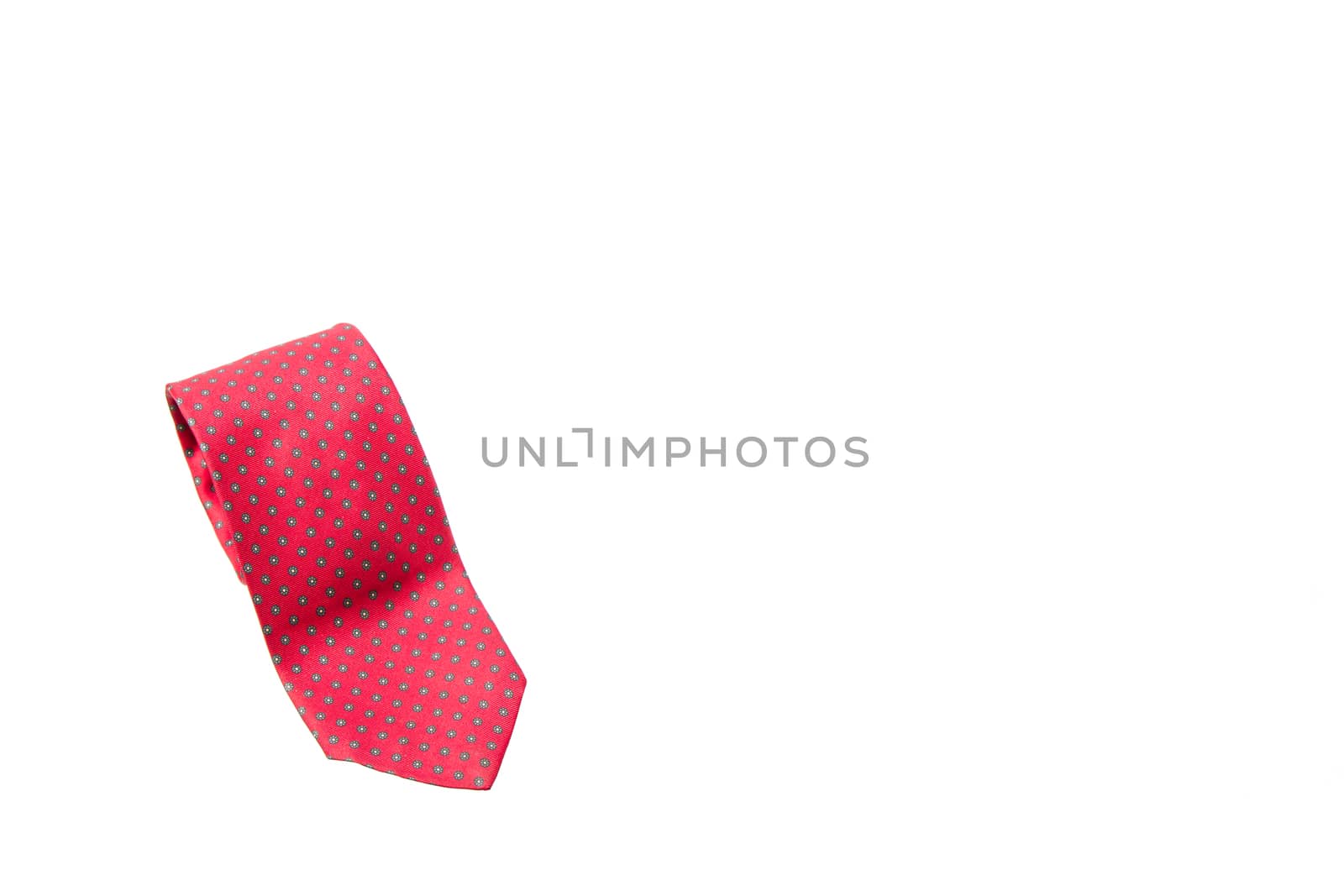 red with green dots business neck tie isolated on white background