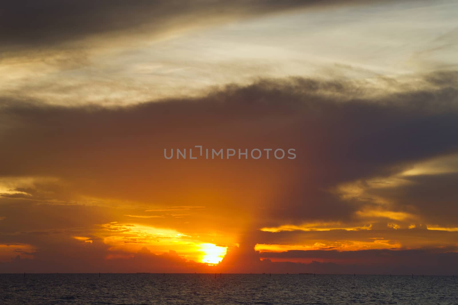  one golden morning with the golden rays of sun reflected by the clouds 