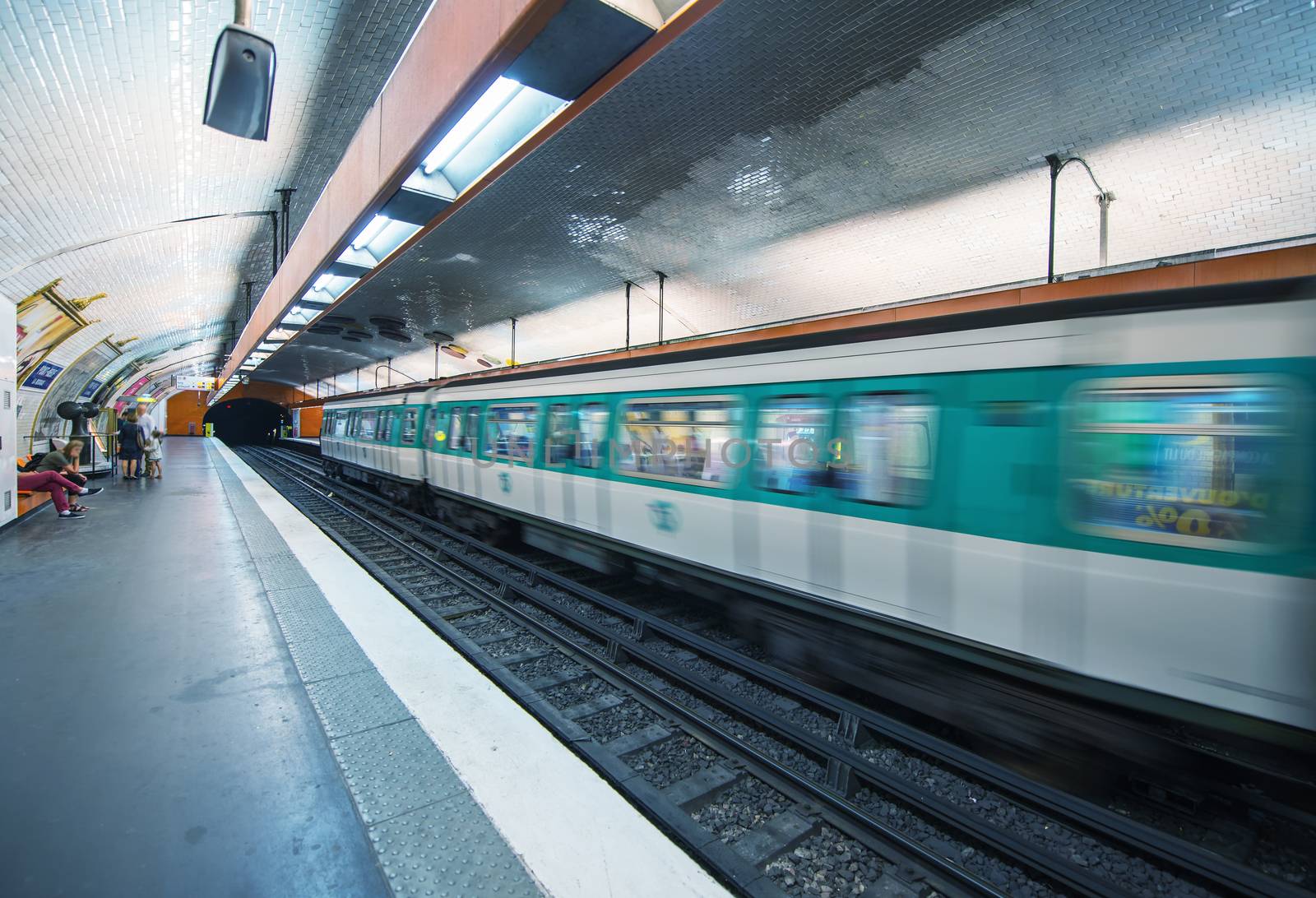 Pairs. Metro train speeding up in the subway by jovannig