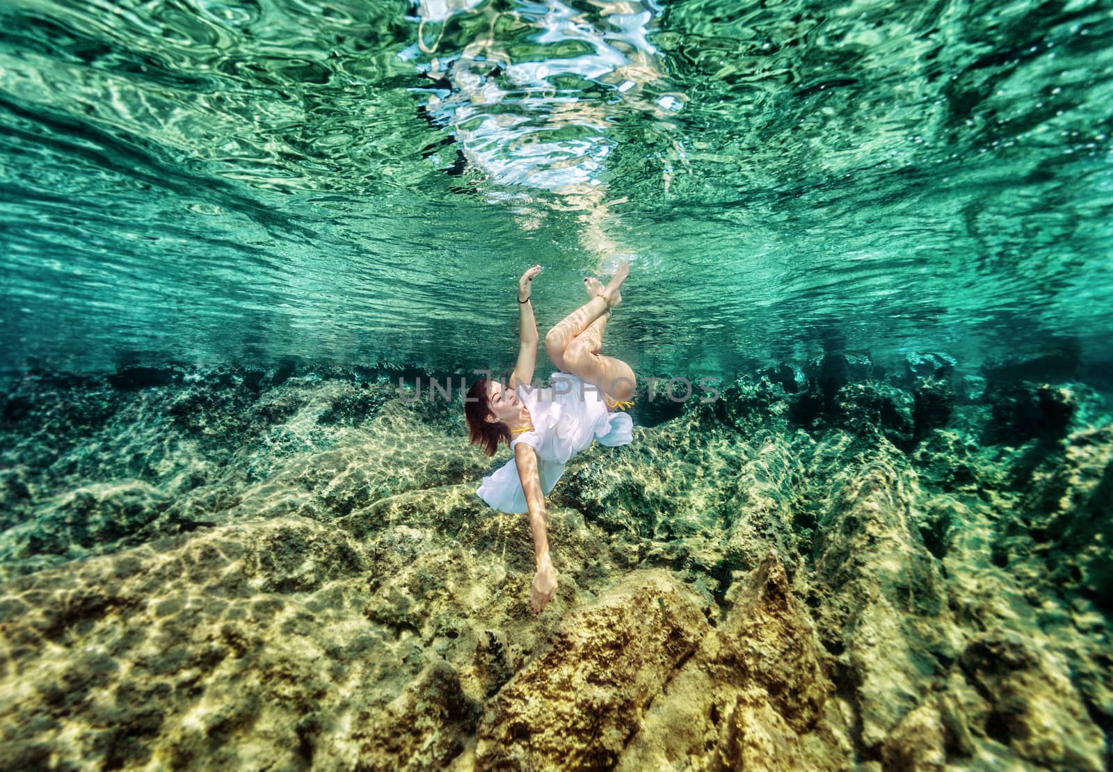 Fashion swimming underwater by Anna_Omelchenko